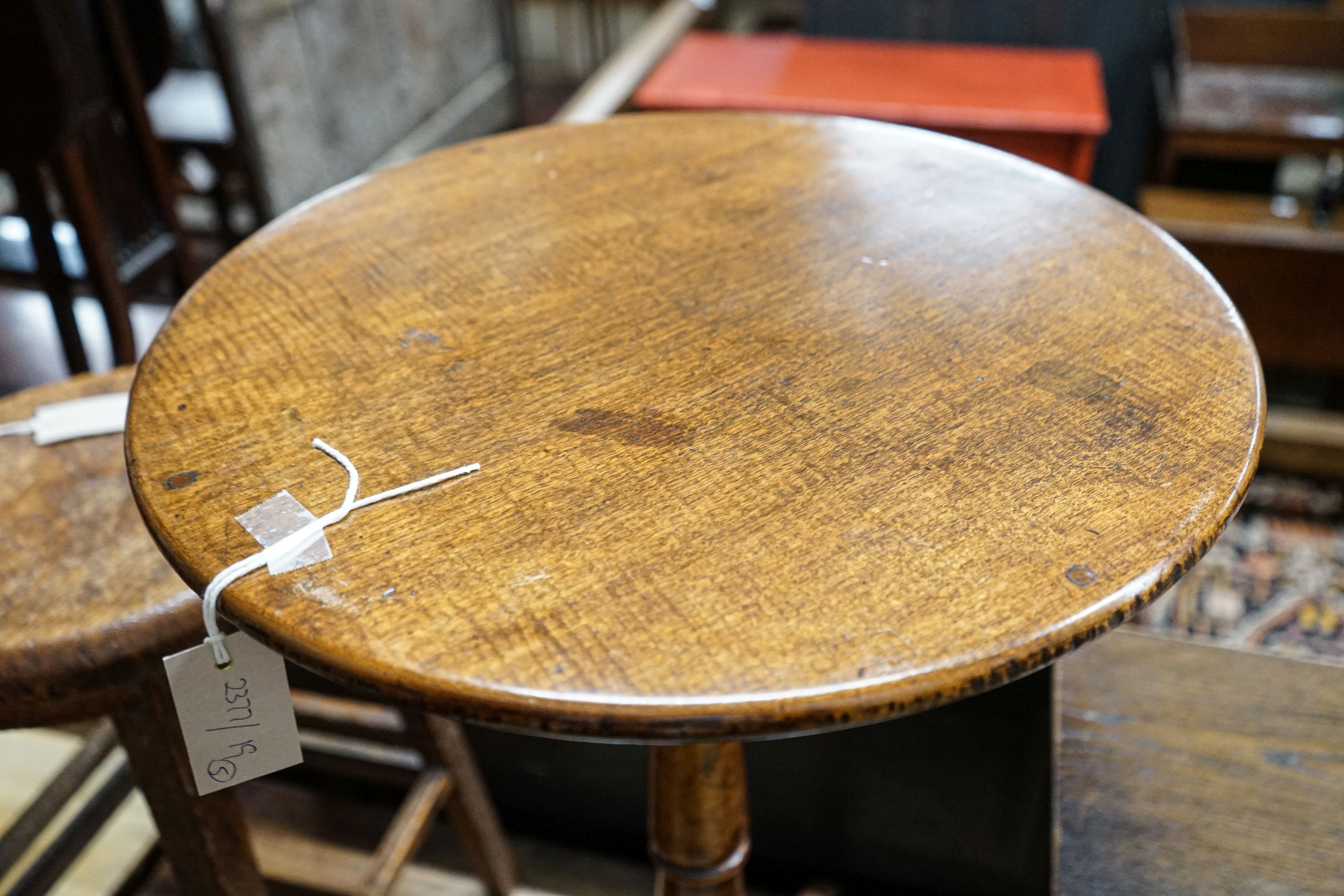 A 19th century circular mahogany tripod wine table, diameter 45cm, height 74cm, together with a nest of tea tables, and a provincial tall oak stool